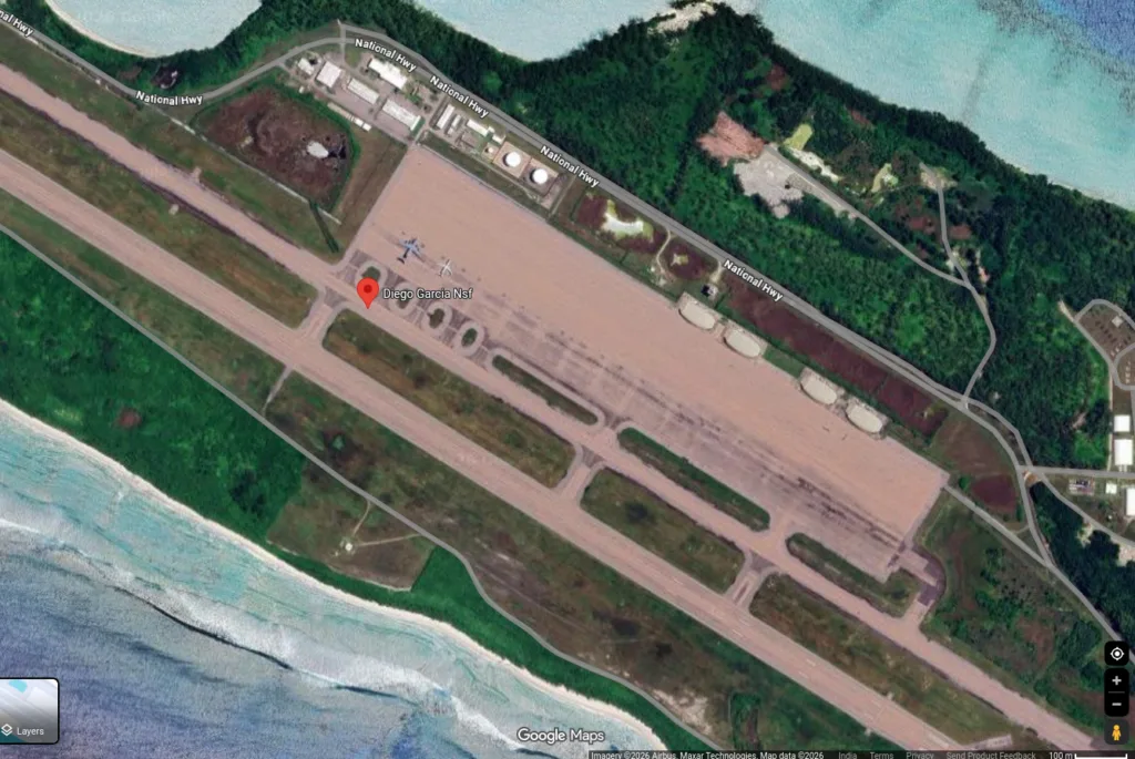 Satellite view of Diego Garcia Naval Support Facility showing the airstrip, and surrounding infrastructure.